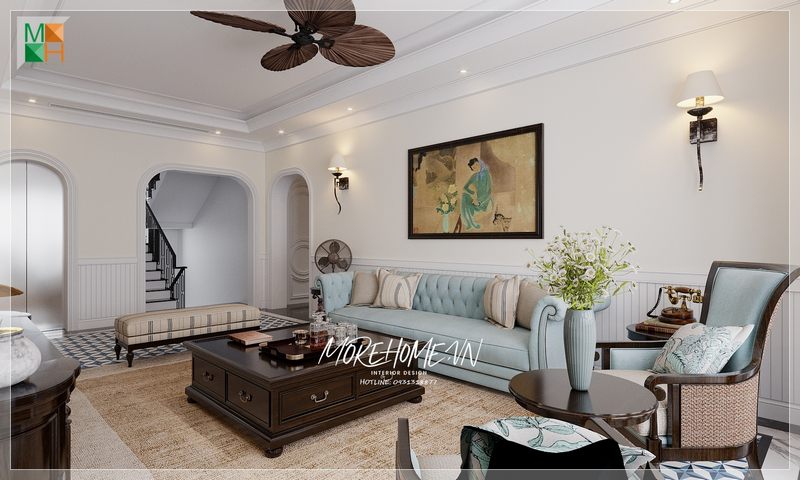 Bàn trà tối màu được đặt ở vị trí trung tâm giúp làm cho không gian phòng khách trở nên thuận tiện và ấn tượng hơn.