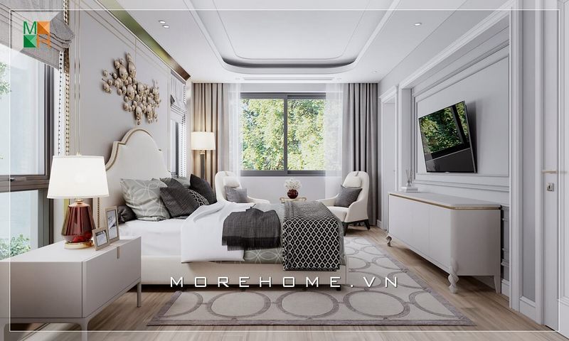 Mẫu thiết kế phòng ngủ gồm giường ngủ và hệ tủ tivi cùng với tap đầu giường được trang trí bằng gam màu trắng tạo ra phong cách tân cổ điển đẹp mắt và sang trọng.